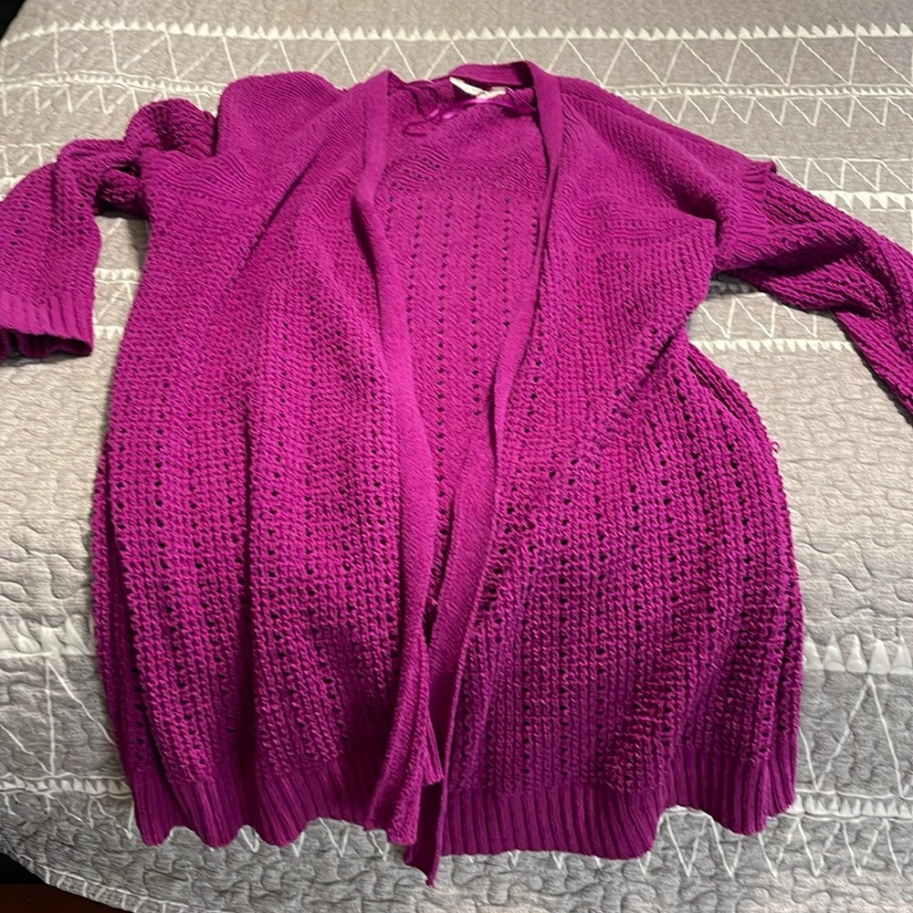 Like brand new. Eyelet cardigan.